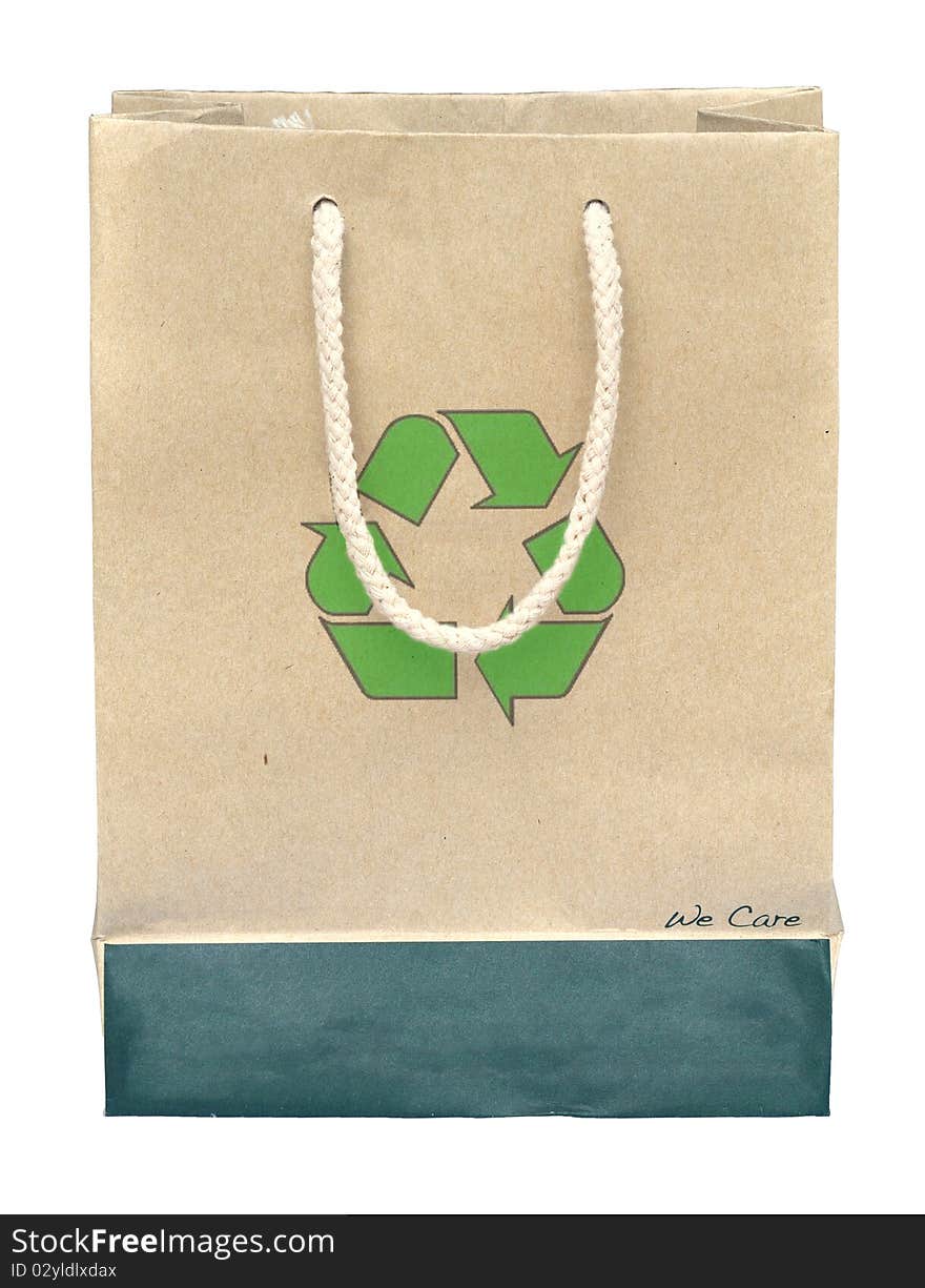 Recycle paper bag with recycle symbol on white background.