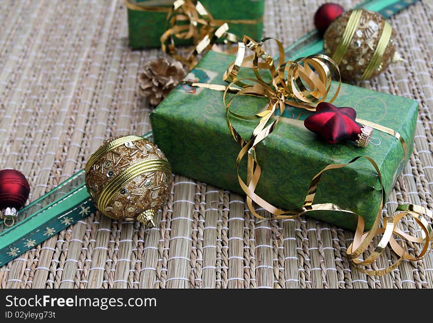 Christmas present with baubles and christmas decorations. Christmas present with baubles and christmas decorations