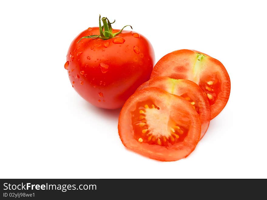 Tomatoes (whole and slised) isolated on white