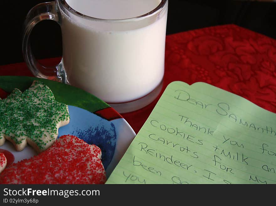 Plate with cookies and a glass of milk for santa claus. Plate with cookies and a glass of milk for santa claus