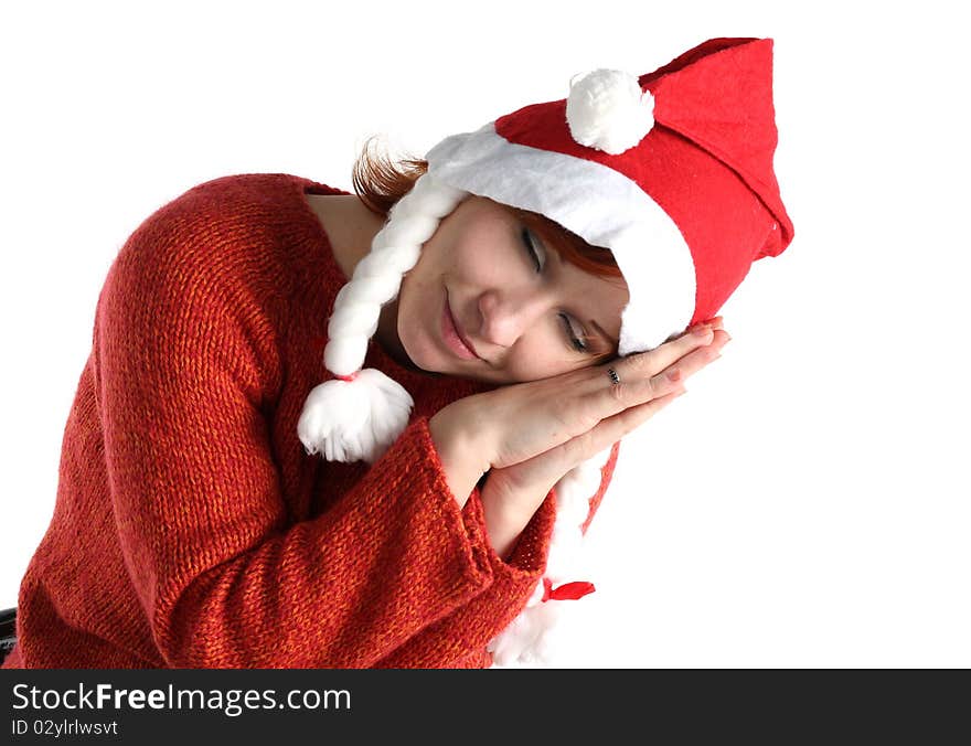 Woman in santa's cap isolated on white background