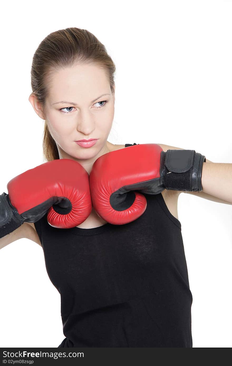 Young female boxer over white