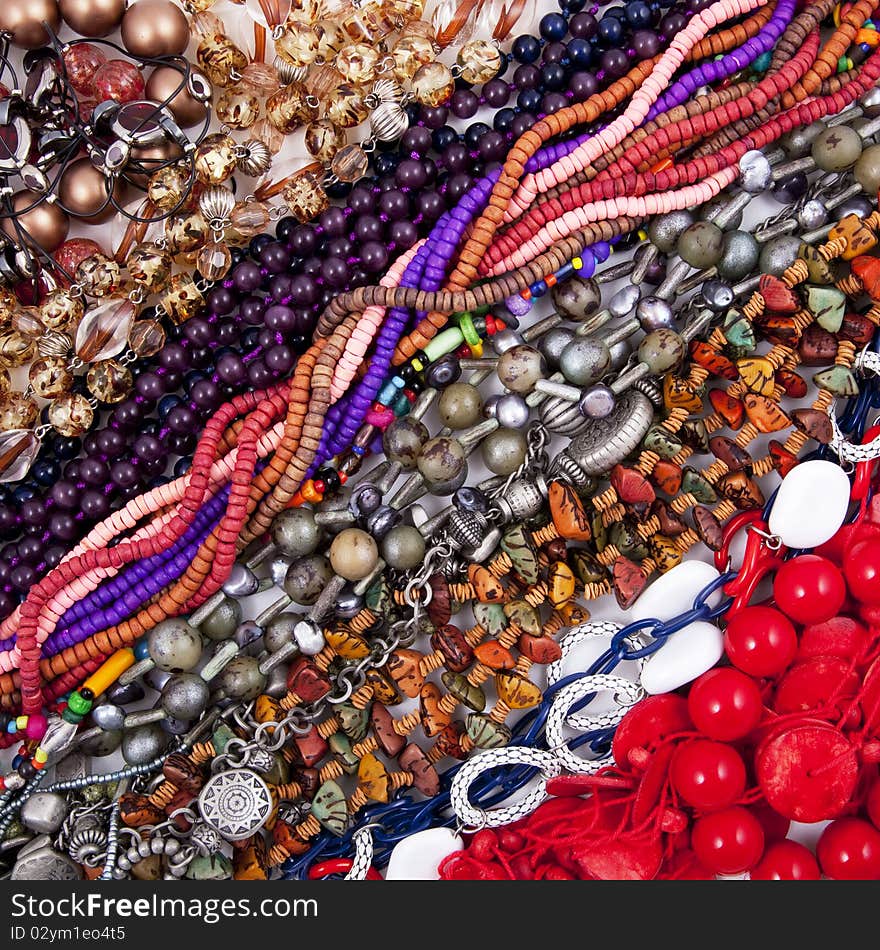 Bijouterie multicolored background made from many necklaces. Bijouterie multicolored background made from many necklaces