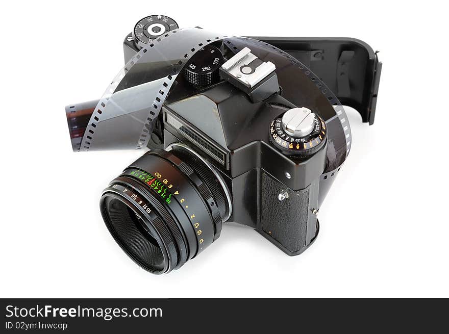 Opened classic manual SLR film camera with film