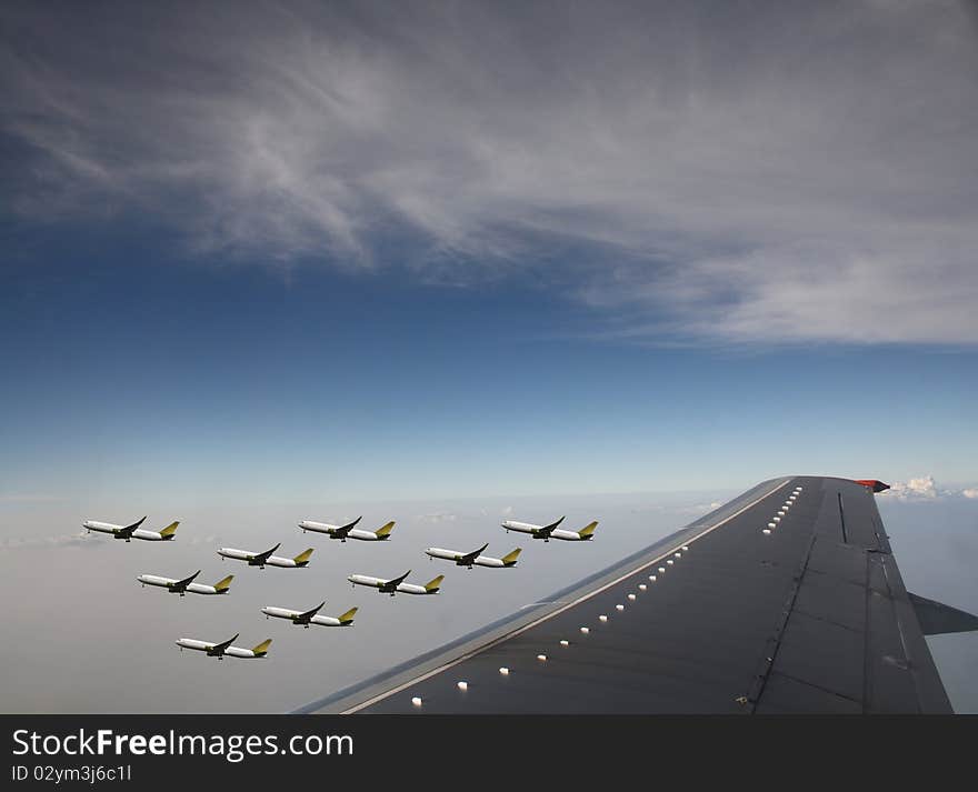 Aircraft in flight over the blue clouds. Aircraft in flight over the blue clouds