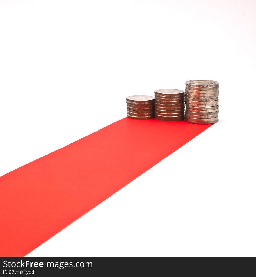 Red carpet and column of coin isolated on white background. Red carpet and column of coin isolated on white background