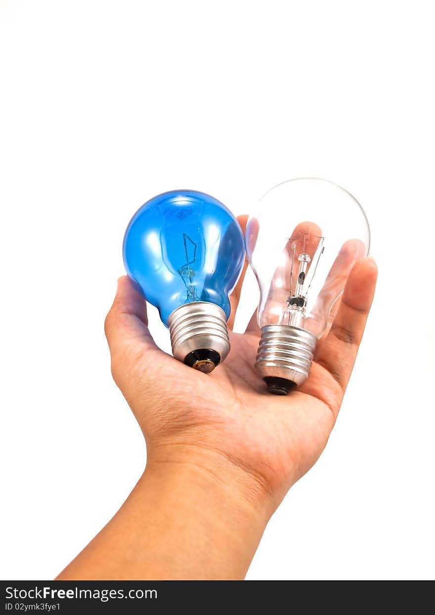 Lightbulb in a hand isolated on white background. Lightbulb in a hand isolated on white background.