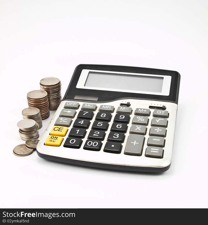 Calculator and Coins isolate on White Background