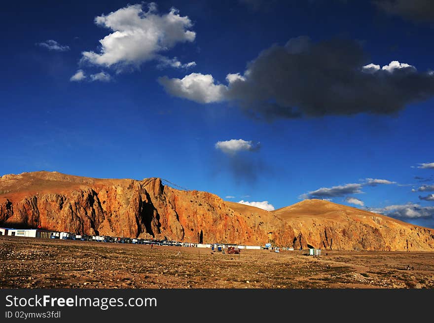 Scenery of a resort at the foot of mountains at sunset in Tibet. Scenery of a resort at the foot of mountains at sunset in Tibet.