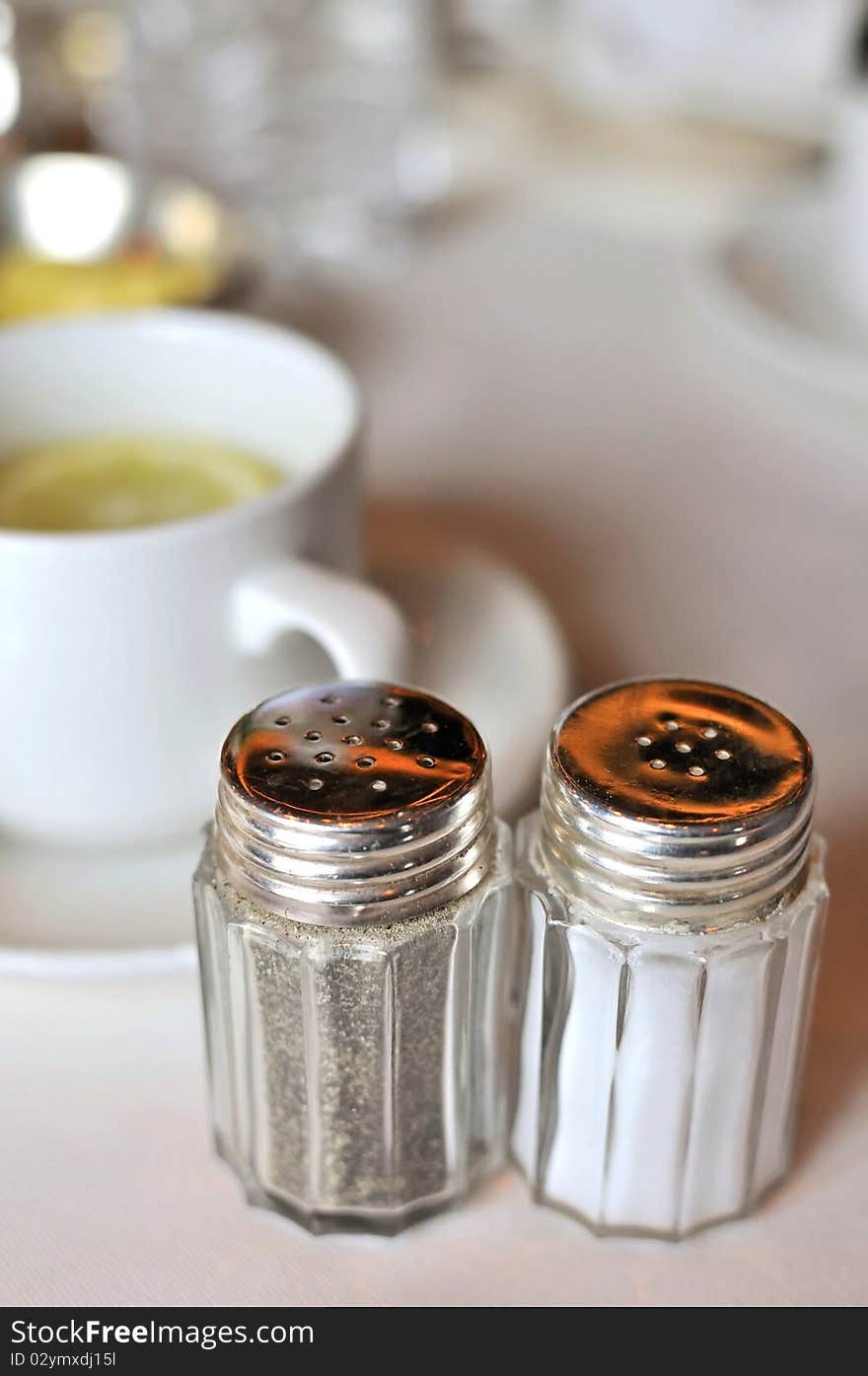 Spices and seasoning on restaurant table.