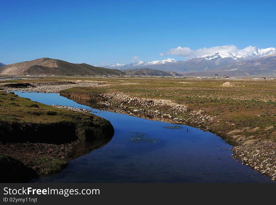 Landscape of brook and mountains in Tibet. Landscape of brook and mountains in Tibet.