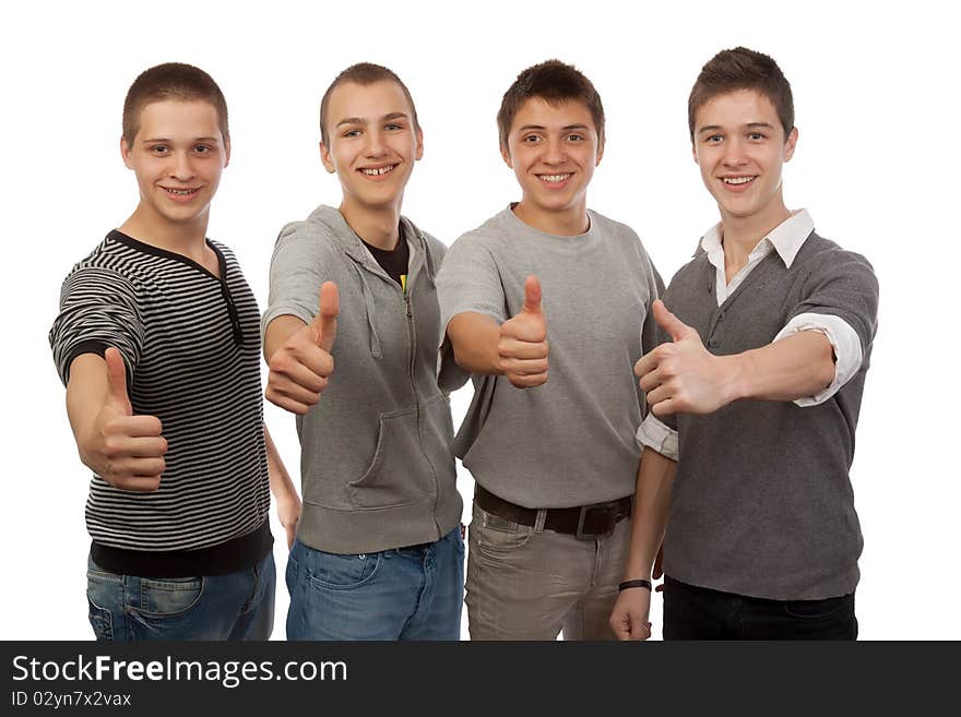 Four young friends gesturing ok. Four young friends gesturing ok