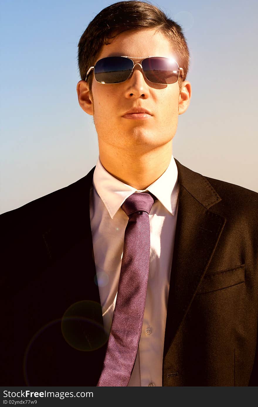 Close up view of a bunisess man in a dark suit. Close up view of a bunisess man in a dark suit.