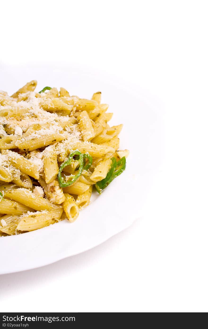 Penne with basil, olive oil and pine dressing (shallow DOF). Penne with basil, olive oil and pine dressing (shallow DOF)