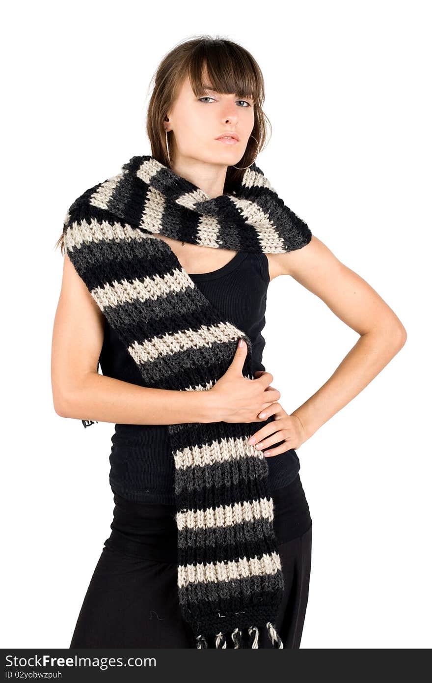 Girl in warm scarf posing in studio. Girl in warm scarf posing in studio