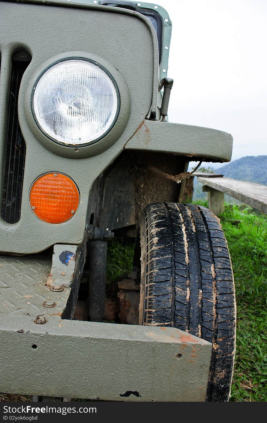 A rusty jeep in the jungle