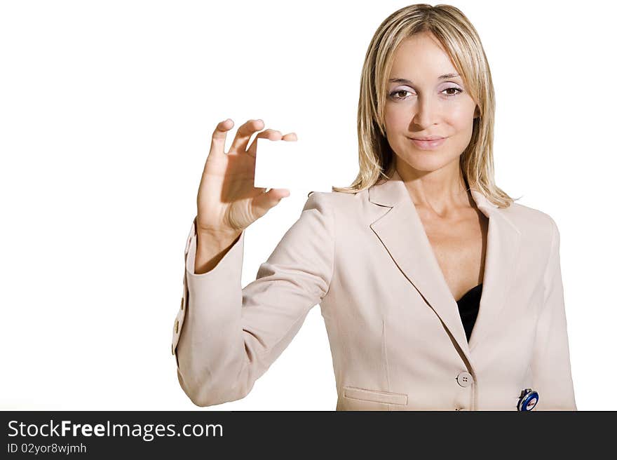 Woman holding out business card and smiling. Focus on business card and hand. Woman holding out business card and smiling. Focus on business card and hand