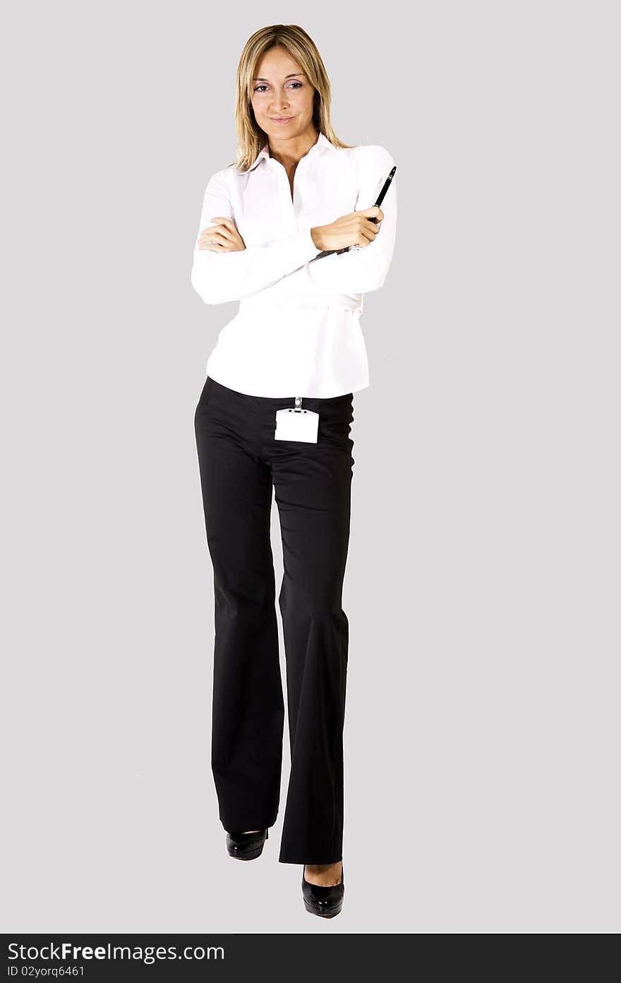 Portrait of a businesswoman smiling over white background. Portrait of a businesswoman smiling over white background