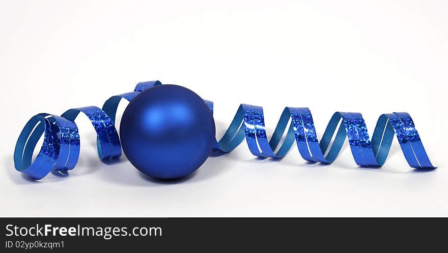 Blue bauble with the blue ribbon on the white background. Blue bauble with the blue ribbon on the white background