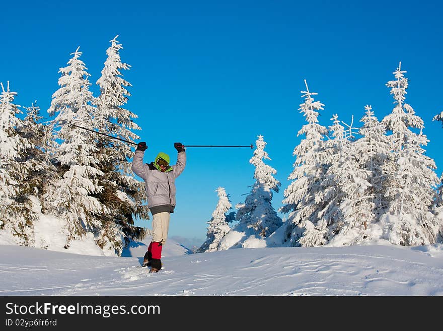 Hiker in winter in mountains