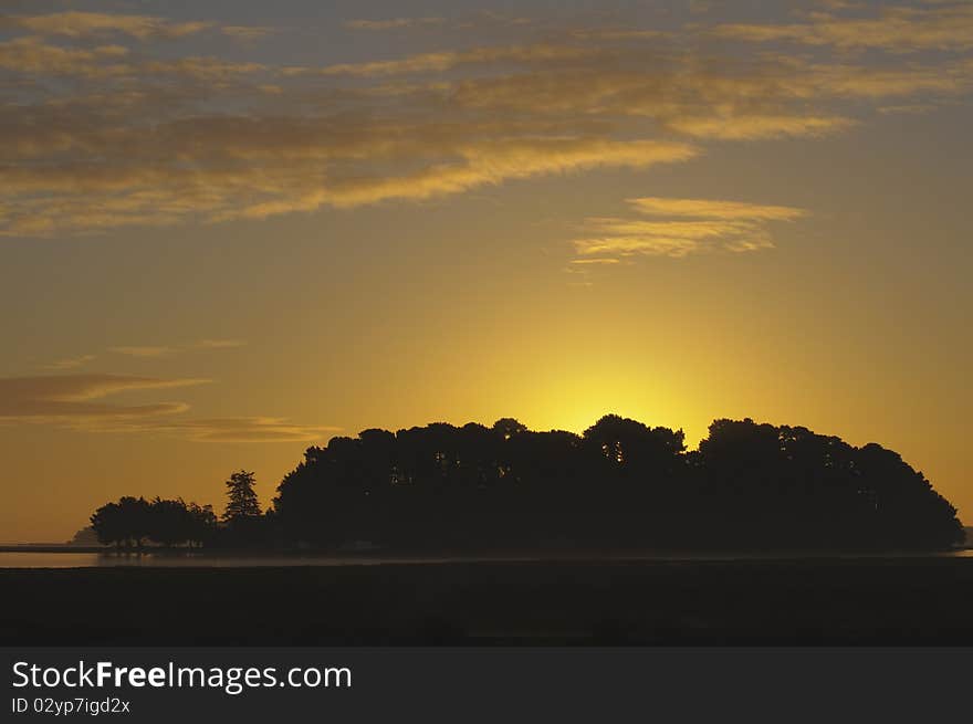 Island sunrise in autumn over poole harbour dorset. Island sunrise in autumn over poole harbour dorset