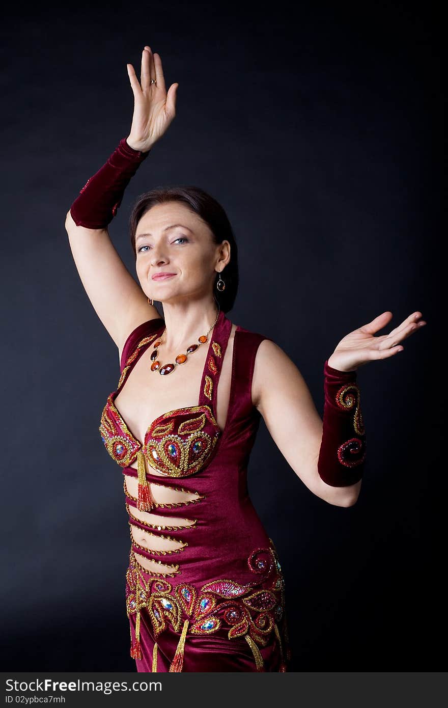 Woman dance in traditional arabic costume