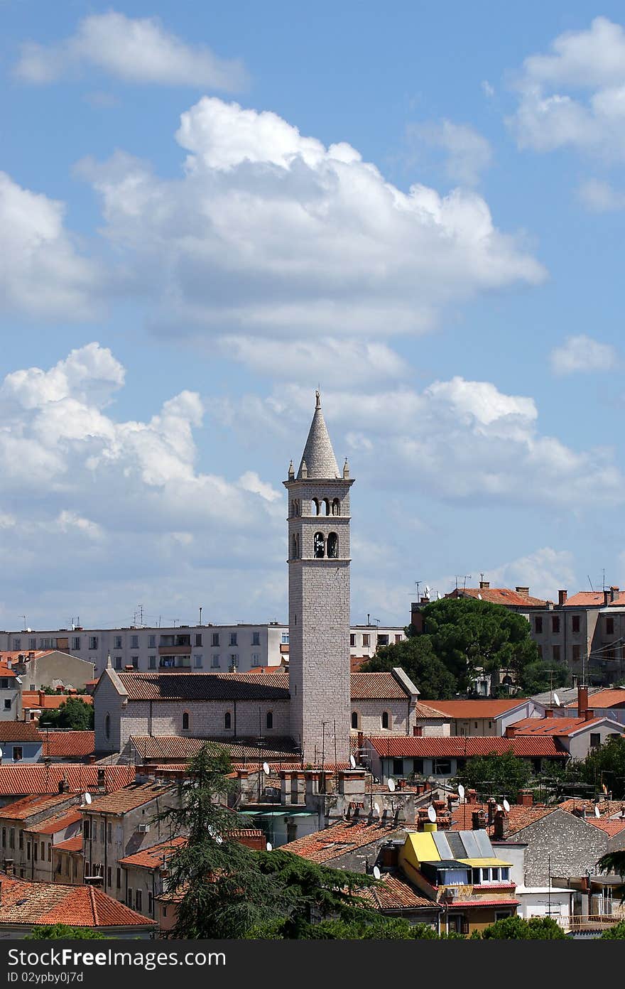 View of the city and the bell tower with a high point, the city of Pula, Croatia. View of the city and the bell tower with a high point, the city of Pula, Croatia