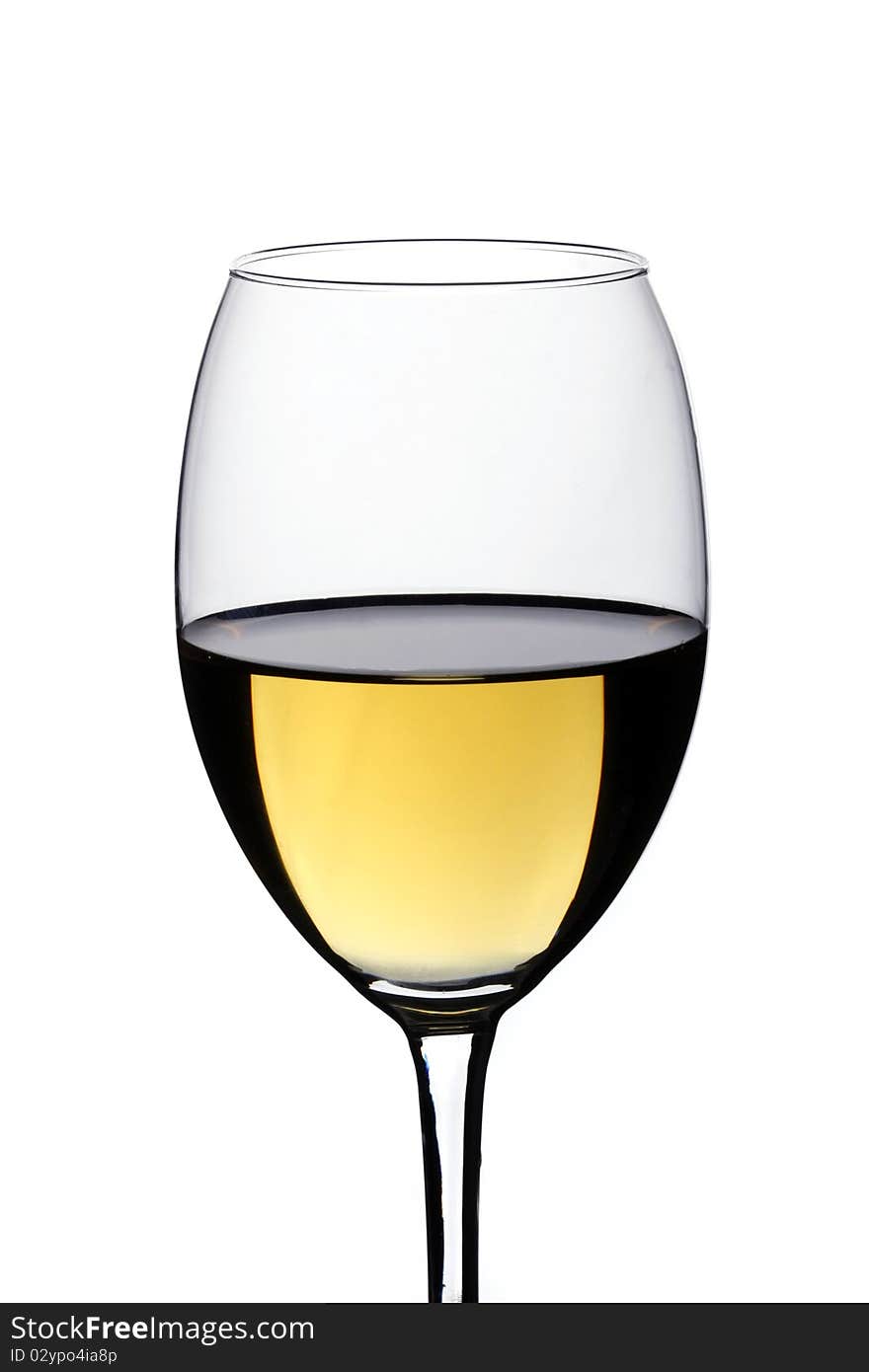 Glass of white wine on a white background and with soft shadow. Glass of white wine on a white background and with soft shadow