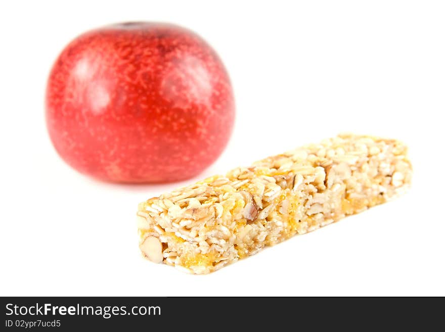 Muesli snack stick with red plum isolated on white. Muesli snack stick with red plum isolated on white