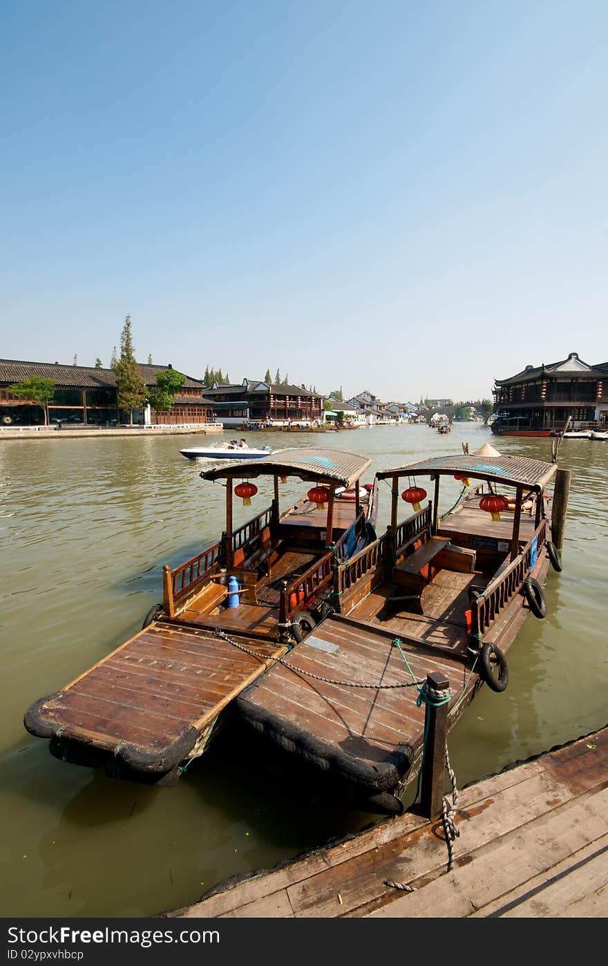 Boat at Chinese water town on river. Boat at Chinese water town on river