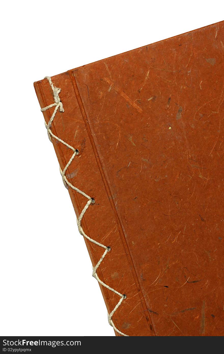 The orange cover of Note book at background