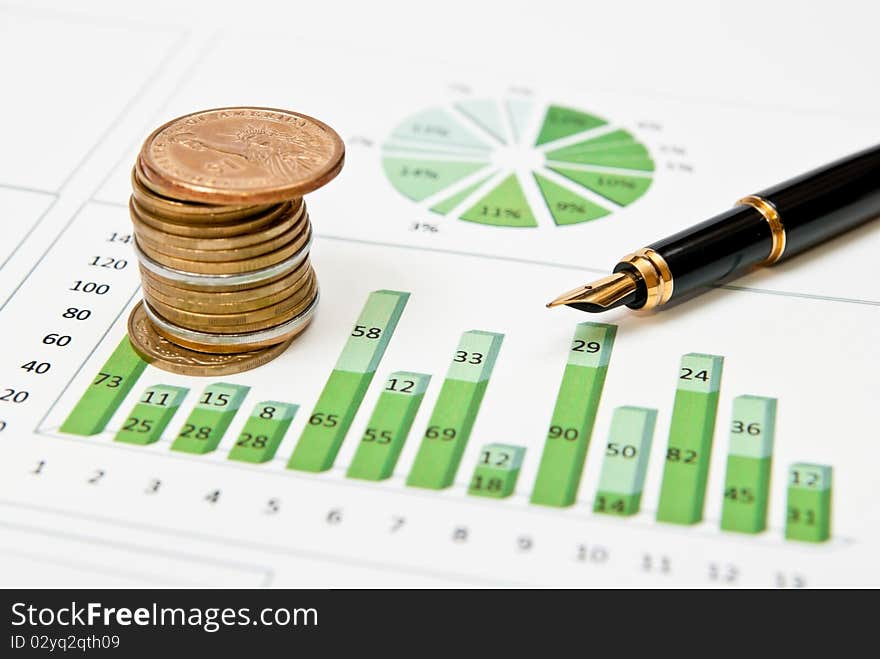 Green graph, chart and pen with stacks of coins. Green graph, chart and pen with stacks of coins