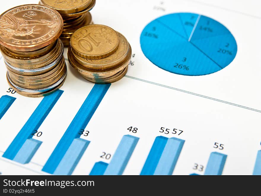 Business graph and chart with stacks of coins. Business graph and chart with stacks of coins