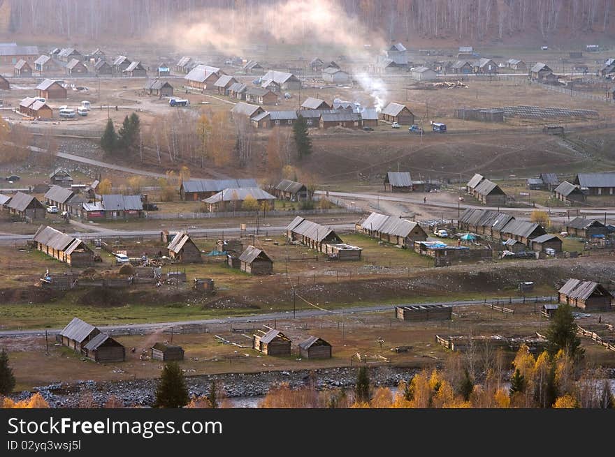 Villages of hemu embraced by forest in xinjiang,china. Villages of hemu embraced by forest in xinjiang,china