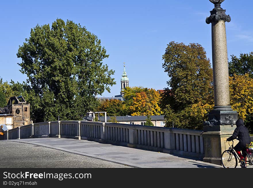 city center of Berlin in autumn, bridge over the river