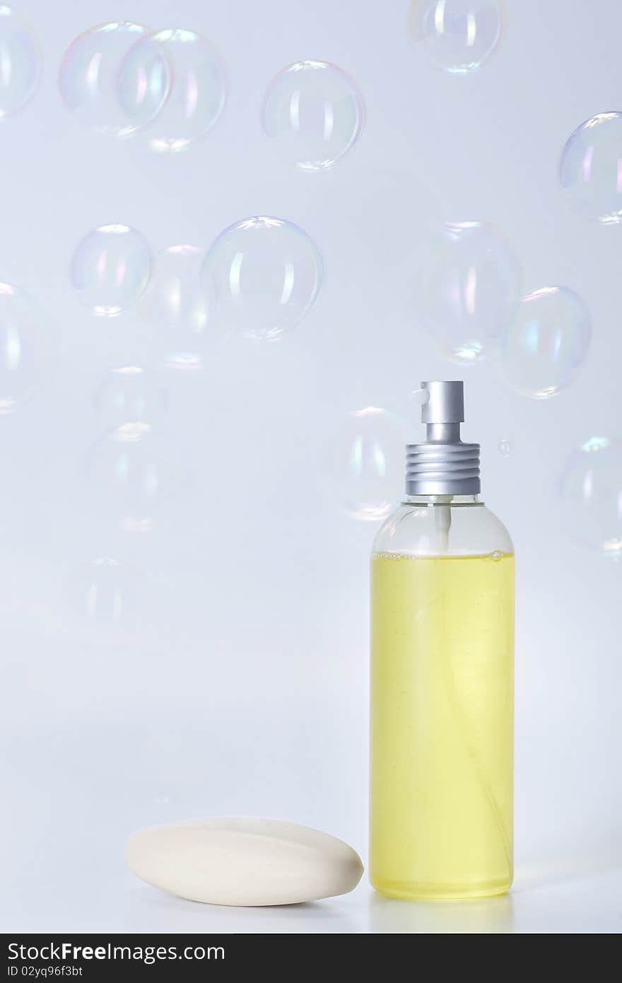 Soap with bubbles on white background