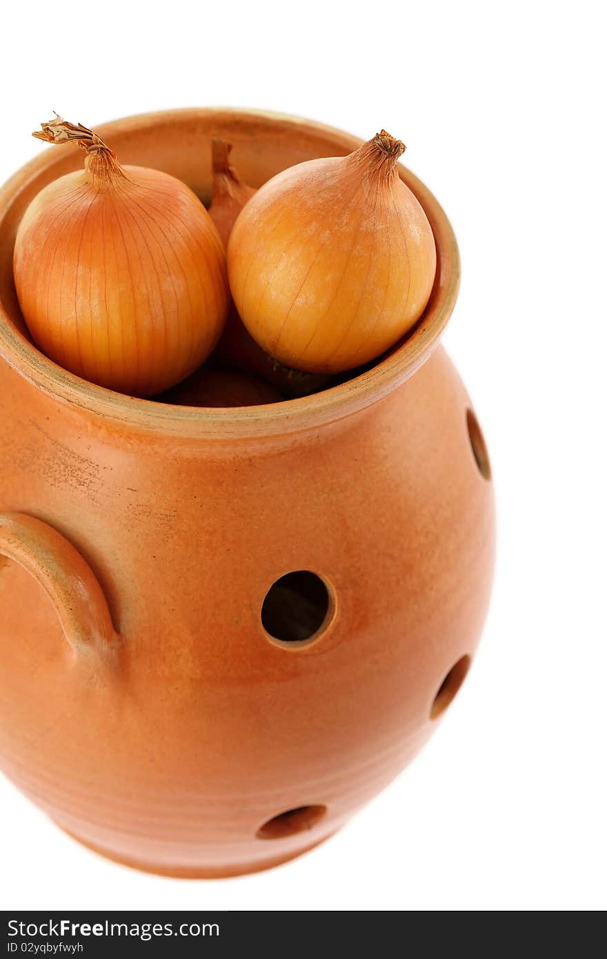 Onion In A Ceramic Pot