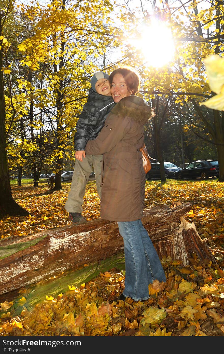 Happy Mother And Son In The Park