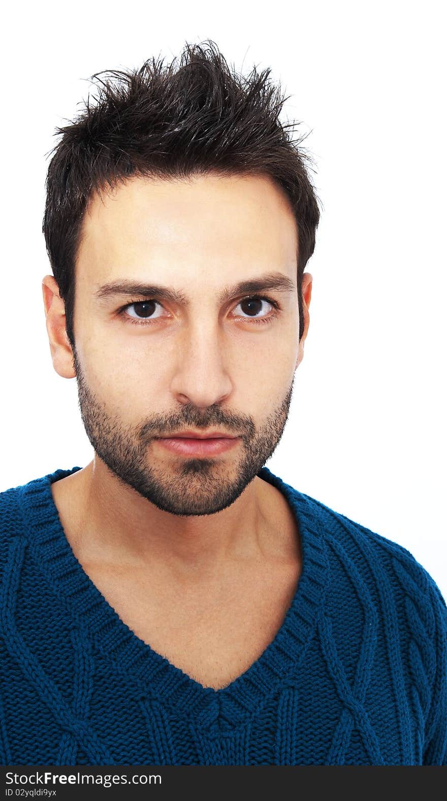 Young man with dark hair and dark eyes posing on white background. Young man with dark hair and dark eyes posing on white background