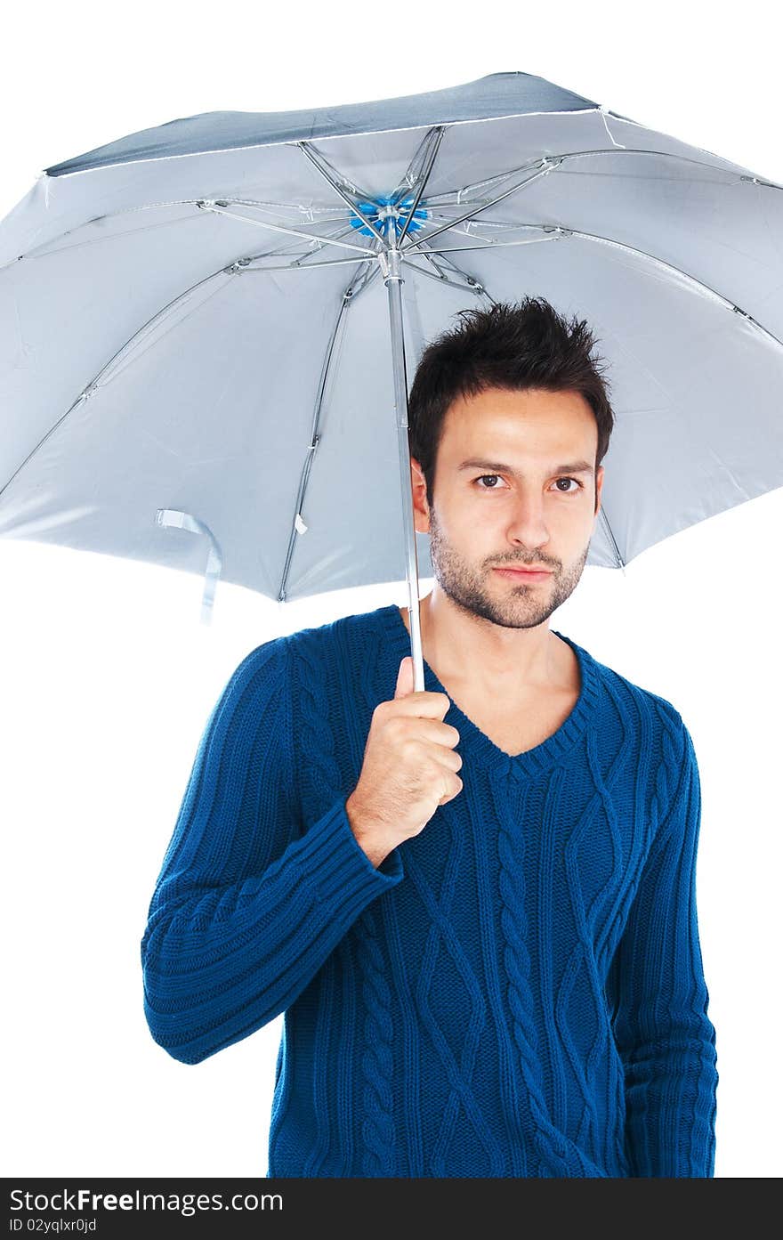 Young man with dark hair and dark eyes posing on white background. Young man with dark hair and dark eyes posing on white background