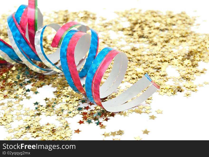 Close up of confetti on white background