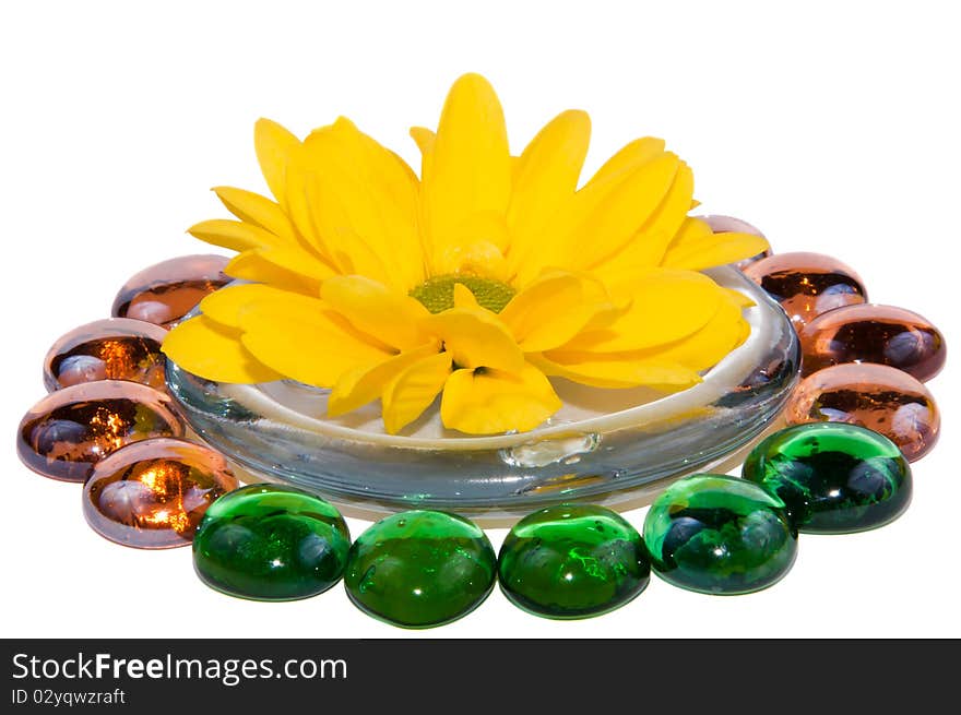 On a white background with glass stones. On a white background with glass stones