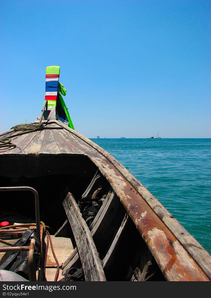 Bow of boat on sea walking in Thai