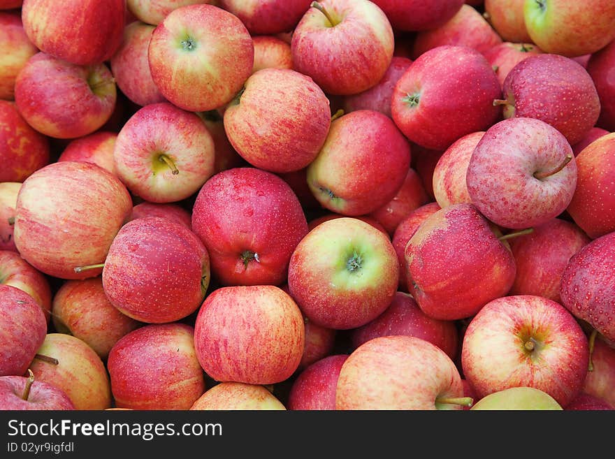 Red ripe apple background (Gala apple)