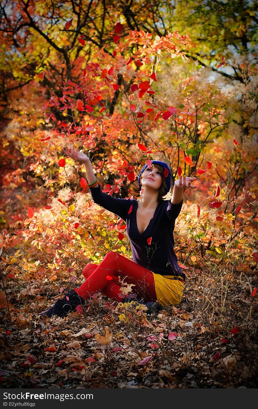 The portrait girl in autumn wood. The portrait girl in autumn wood