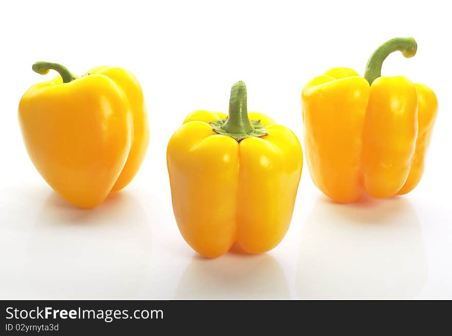 Colourful peppers on the white background