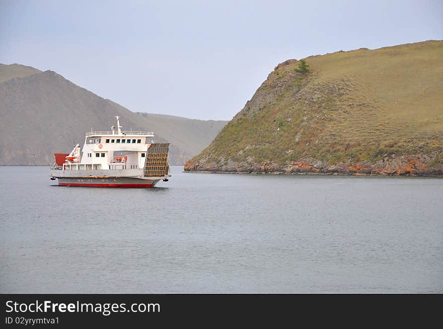 Ferry which goes between big land and Olhon island at Baikal lake. Ferry which goes between big land and Olhon island at Baikal lake