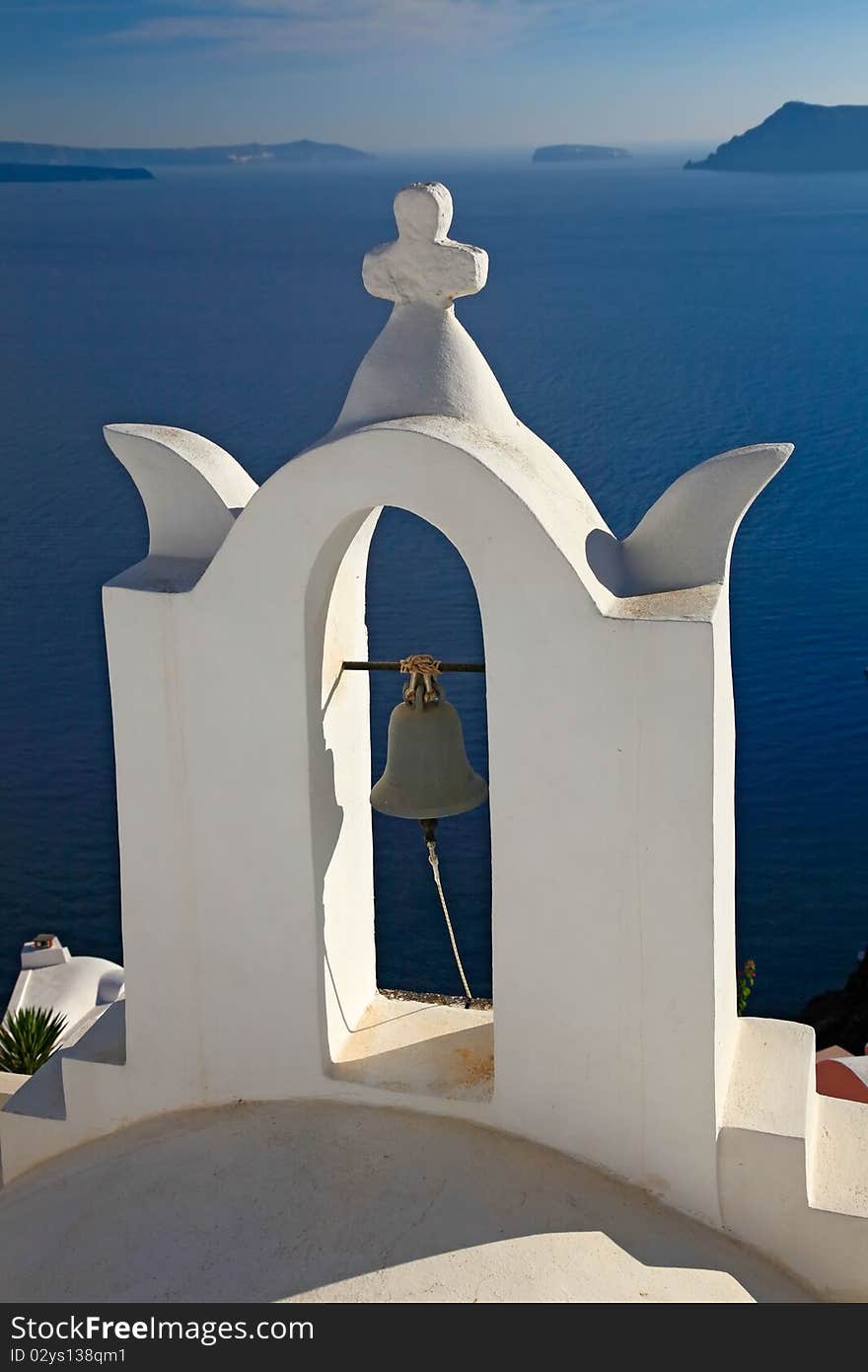 Bell tower of small church in Oia village, Santorini, Greece. Bell tower of small church in Oia village, Santorini, Greece.