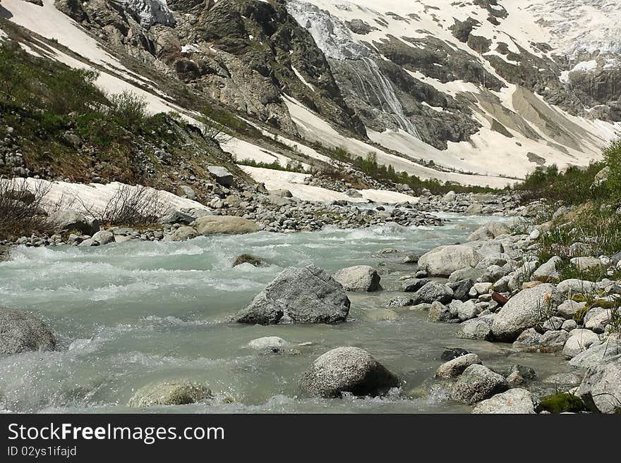 Mountain Tana on Caucasus. Rapid mountain stream. republic North Ossetia, Russian Federation