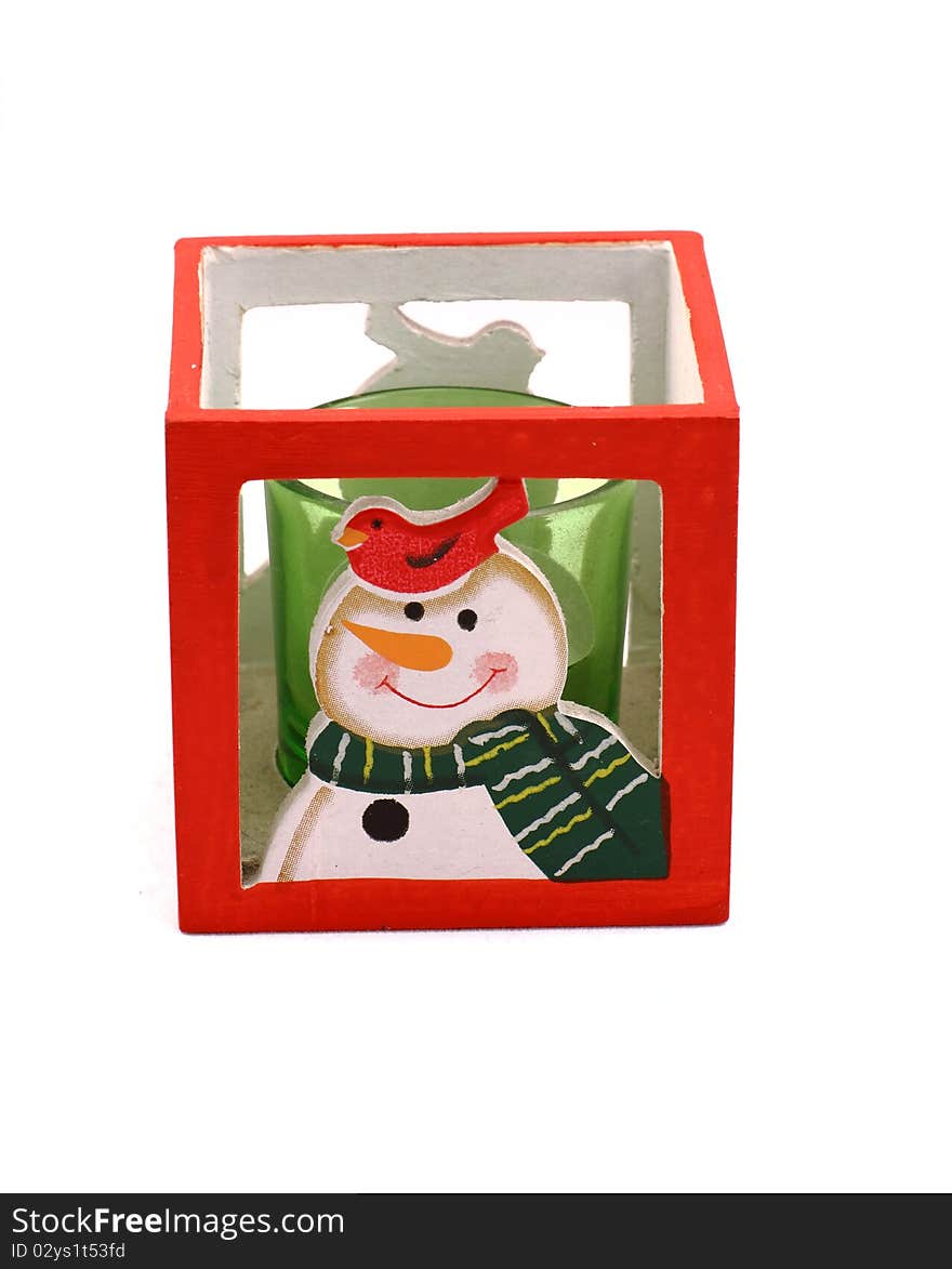 Red candlestick with the snowman and green candle